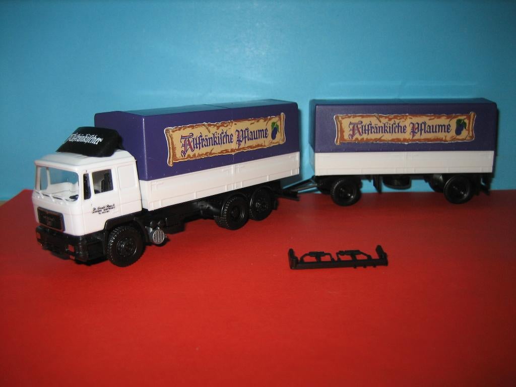 Gerald-Rauch-Pflaume  MAN combi  Herpa, Ophalen of Verzenden, Zo goed als nieuw, Bus of Vrachtwagen, Herpa