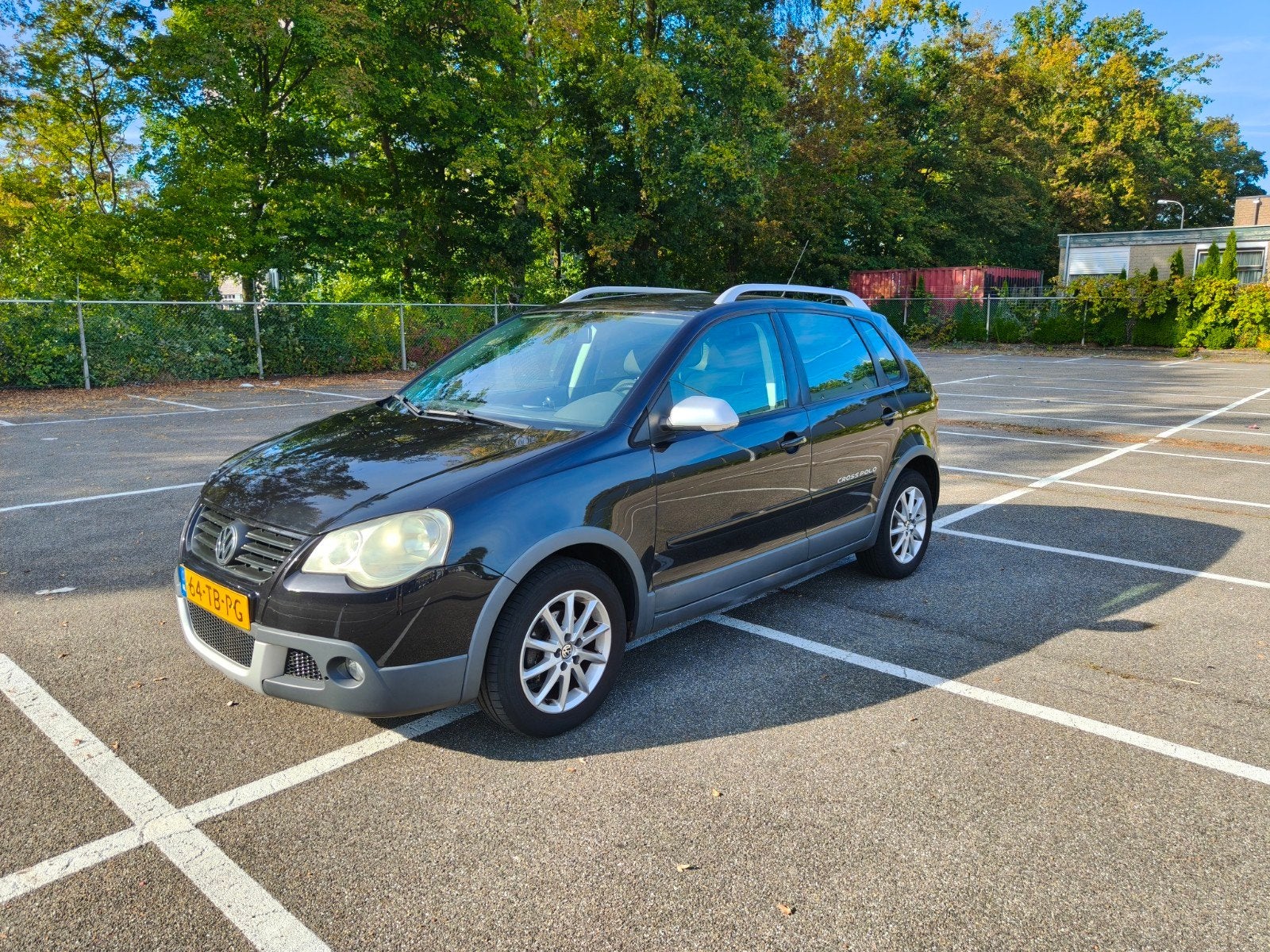 Volkswagen Polo 1.4 16V 59KW Cross 2006 Zwart, Auto's, Voorwielaandrijving, 15 km/l, 40 €/maand, Zwart