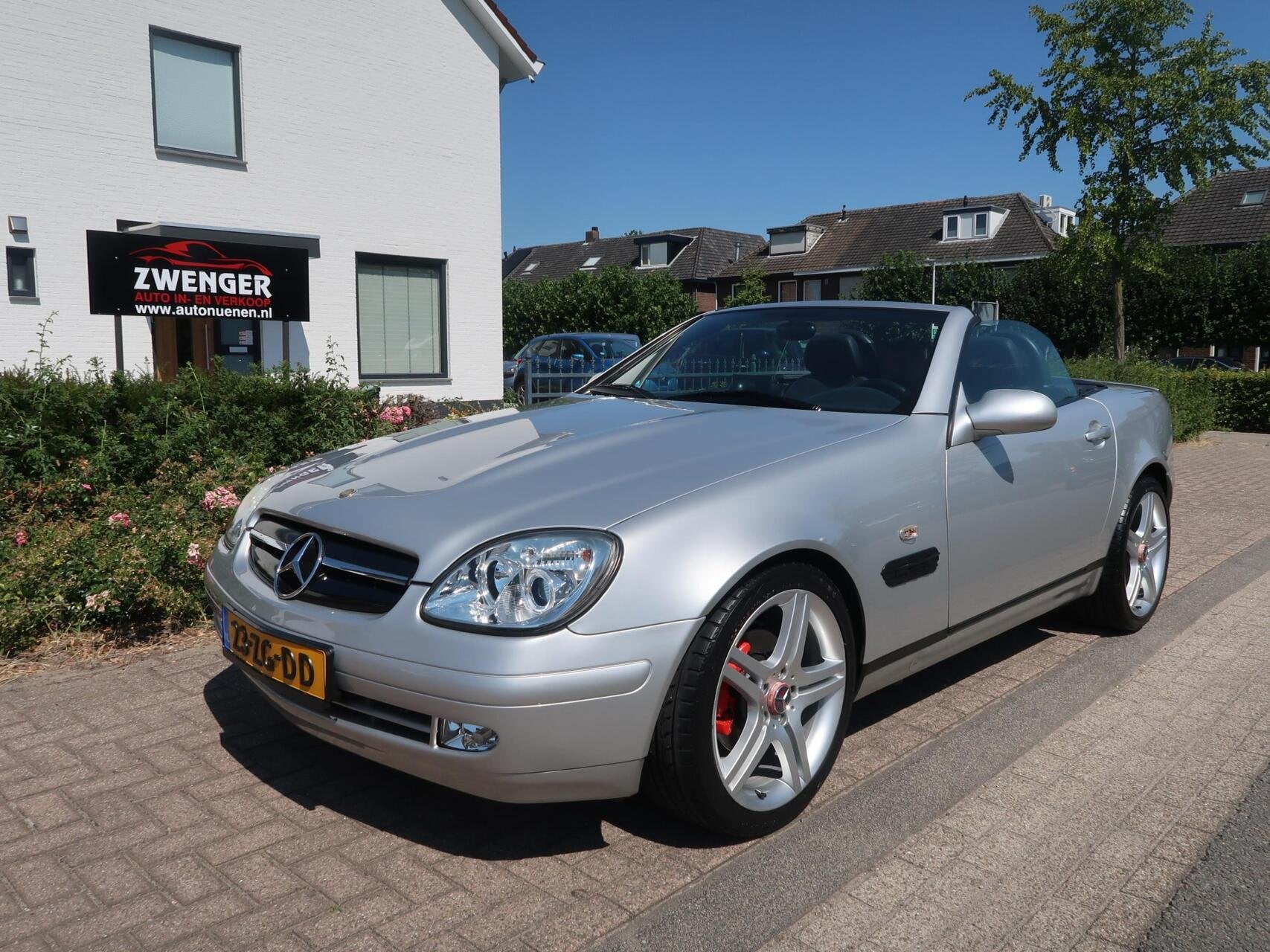 Mercedes SLK-klasse 230 K Aut NAVIGATIE|BLUETOOTH|AIRCO|CRUI, Auto's, Verwarmde buitenspiegels, Achterwielaandrijving, Gebruikt