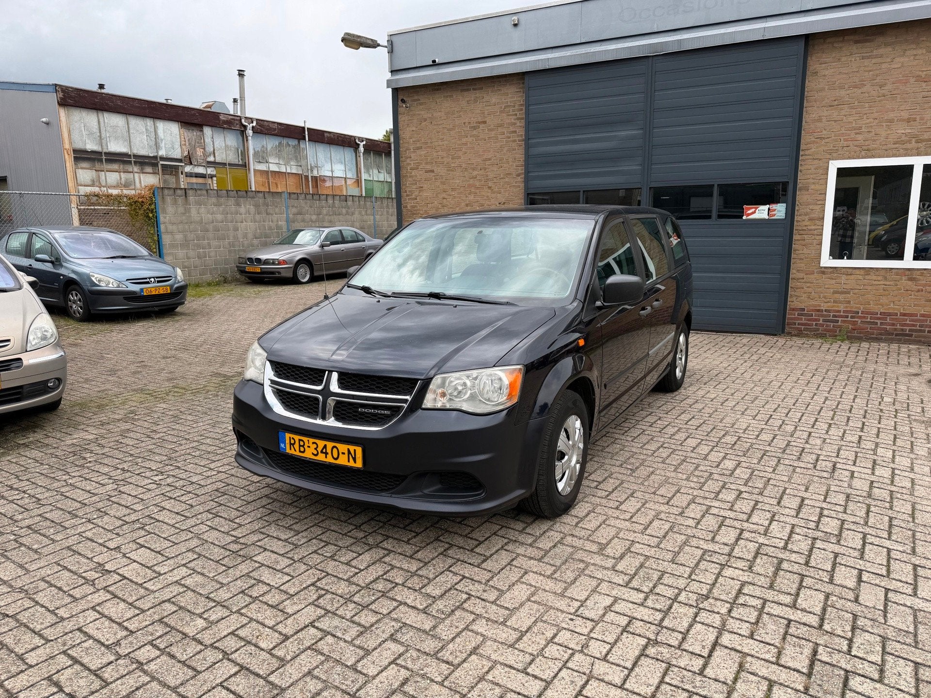 Dodge Grand Caravan 3.6 V6// goede auto// Leest tekst, Auto's, Euro 5, Zwart, Blauw, 7 stoelen