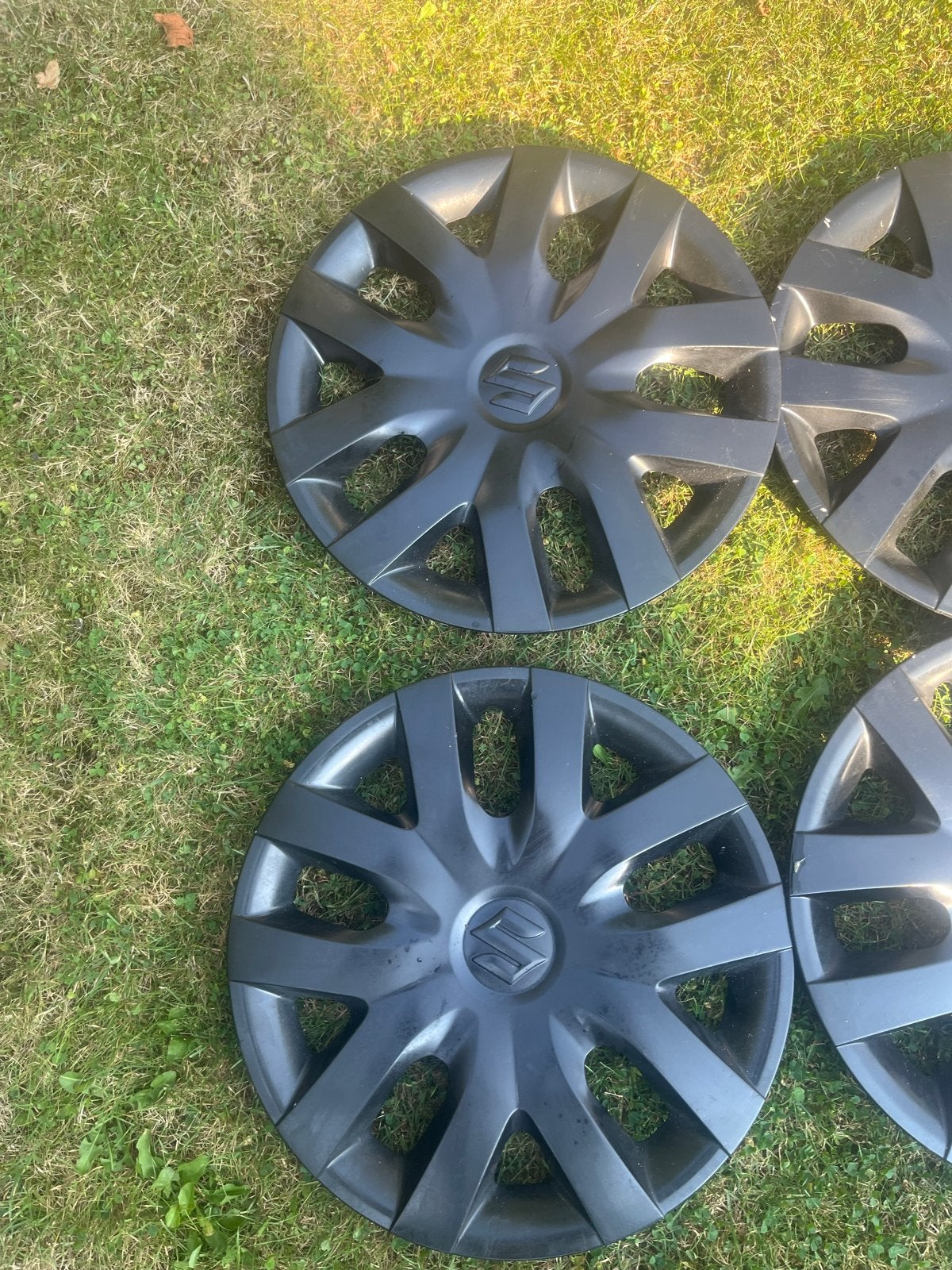 15 inch Suzuki wieldoppen in zeer goede staat, inclusief rin, Ophalen of Verzenden, Zo goed als nieuw