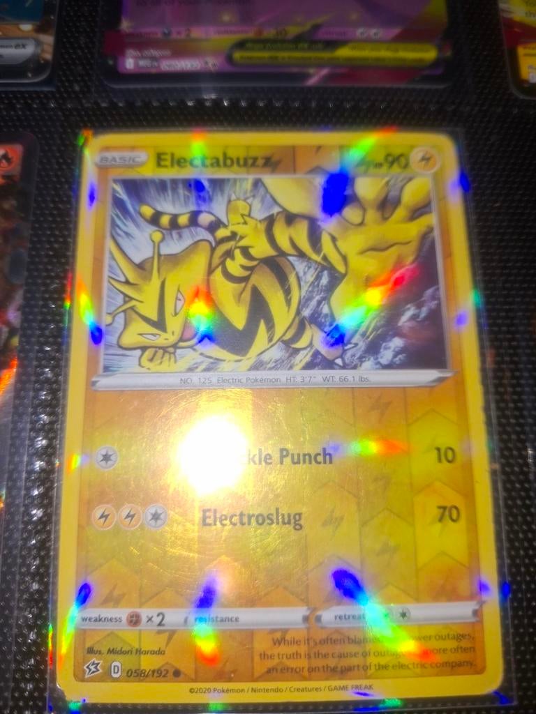 Electabuzz Pokémon Kaart - Foil (058/192), Ophalen of Verzenden, Zo goed als nieuw, Losse kaart, Foil