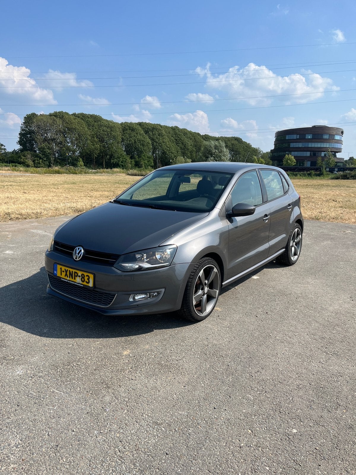 Volkswagen Polo 1.4 16V FSI 63KW 2010 Grijs, 970 kg, Stof, 40 €/maand, Zwart