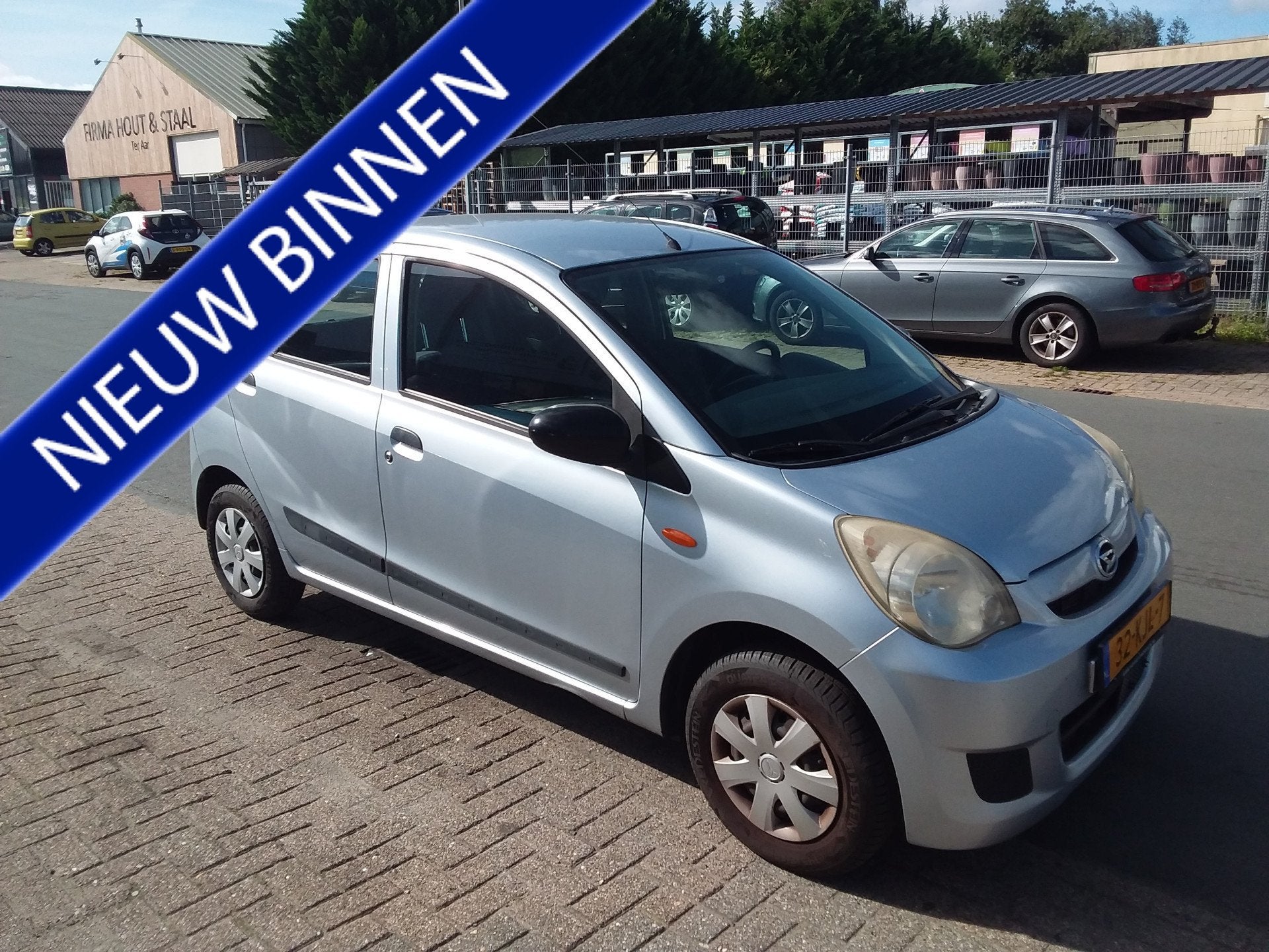 Daihatsu Cuore 1.0 Clever (bj 2009), Auto's, Voorwielaandrijving, Stof, 4 stoelen, Cuore
