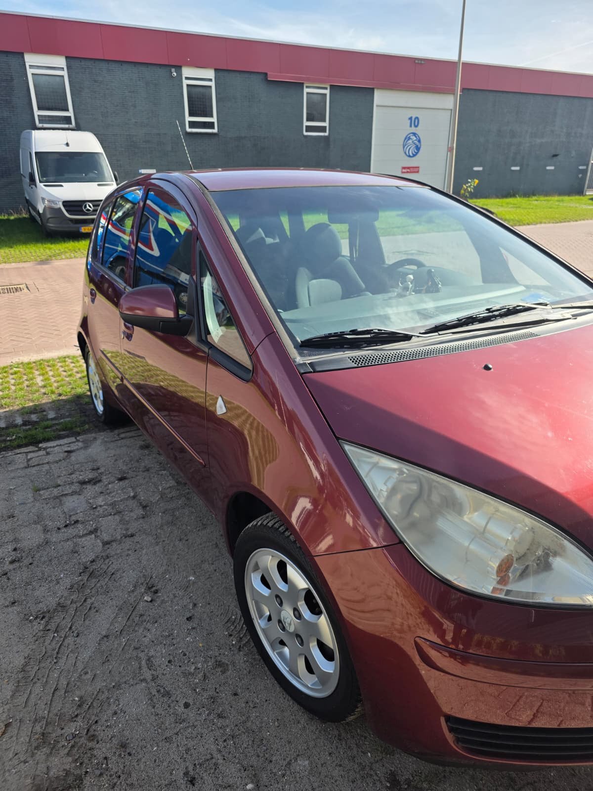 Mitsubishi Colt 1.3 Rood (2005) 5-deurs – Lage km stand, Auto's, 31 €/maand, Colt, Origineel Nederlands, Handgeschakeld