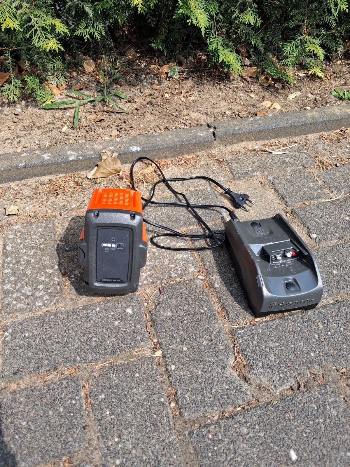 husqvarna accu en oplader, Ophalen