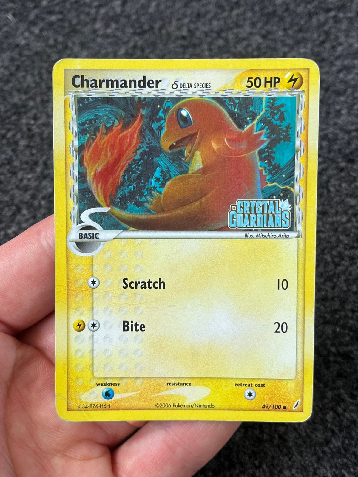 Pokémon Charmander reverse holo #49 ex crystal guardians -LP, Ophalen of Verzenden, Zo goed als nieuw, Losse kaart, Foil