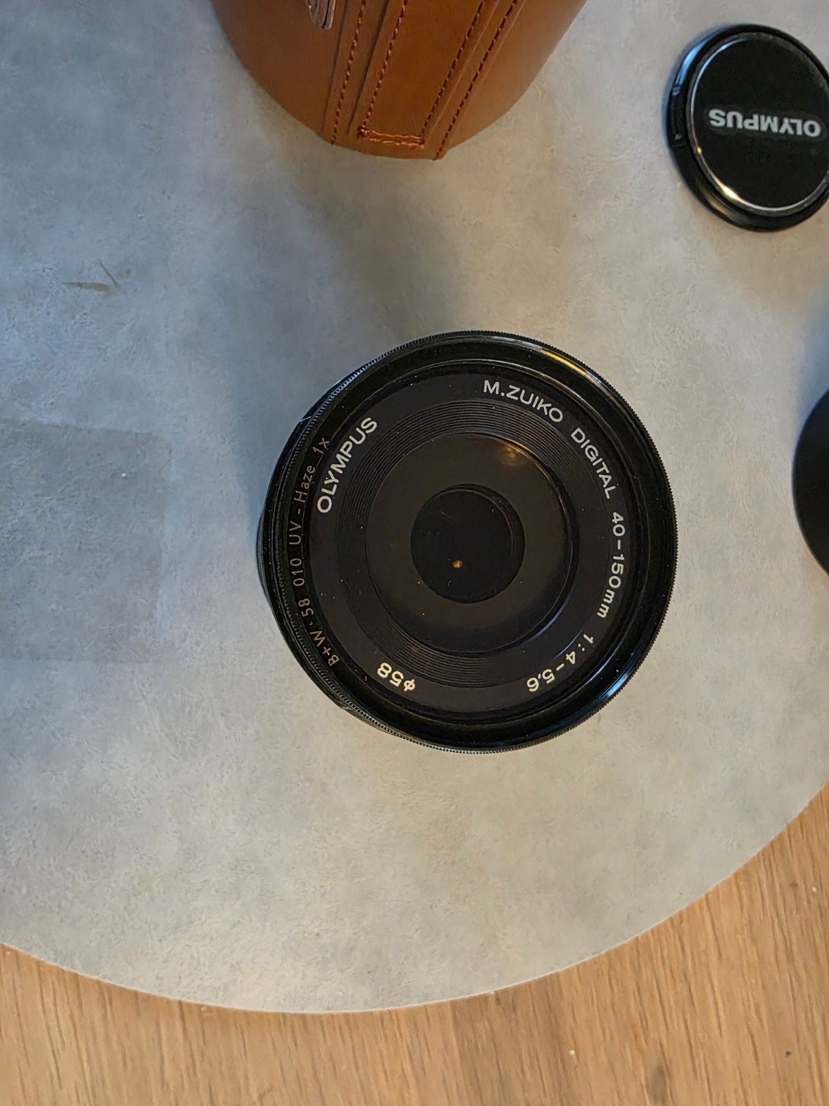 Olympus M.Zuiko 40-150mm f/4-5.6 R – Complete set met filter, Micro Four Thirds, Olympus, Zo goed als nieuw, Zonnekap