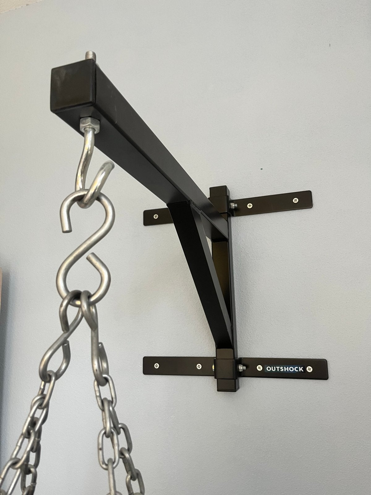 muurbeugel bokszak Outshock, Sport en Fitness, Boksen, Ophalen, Gebruikt, Boks-accessoire