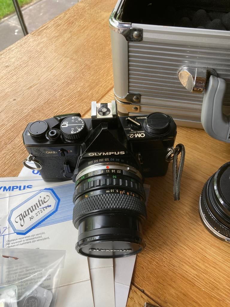 Olympus OM-2N Spiegelreflexcamera met lens en koffer, Ophalen of Verzenden, Zo goed als nieuw, Spiegelreflex, Olympus