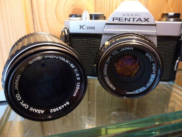 Pentax K1000 foto camera / 2 x pentax objectief., Ophalen, Gebruikt, Spiegelreflex, Canon