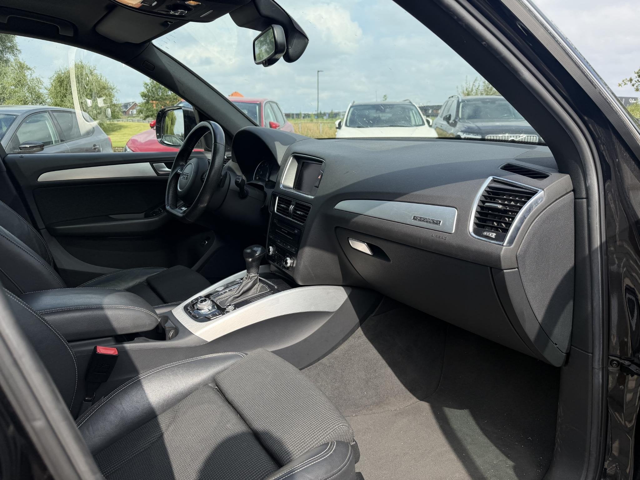 Audi Q5 2.0 TFSI quattro Pro Line S, Auto's, Audi, Gebruikt, Zwart, 4 cilinders, Leder en Stof