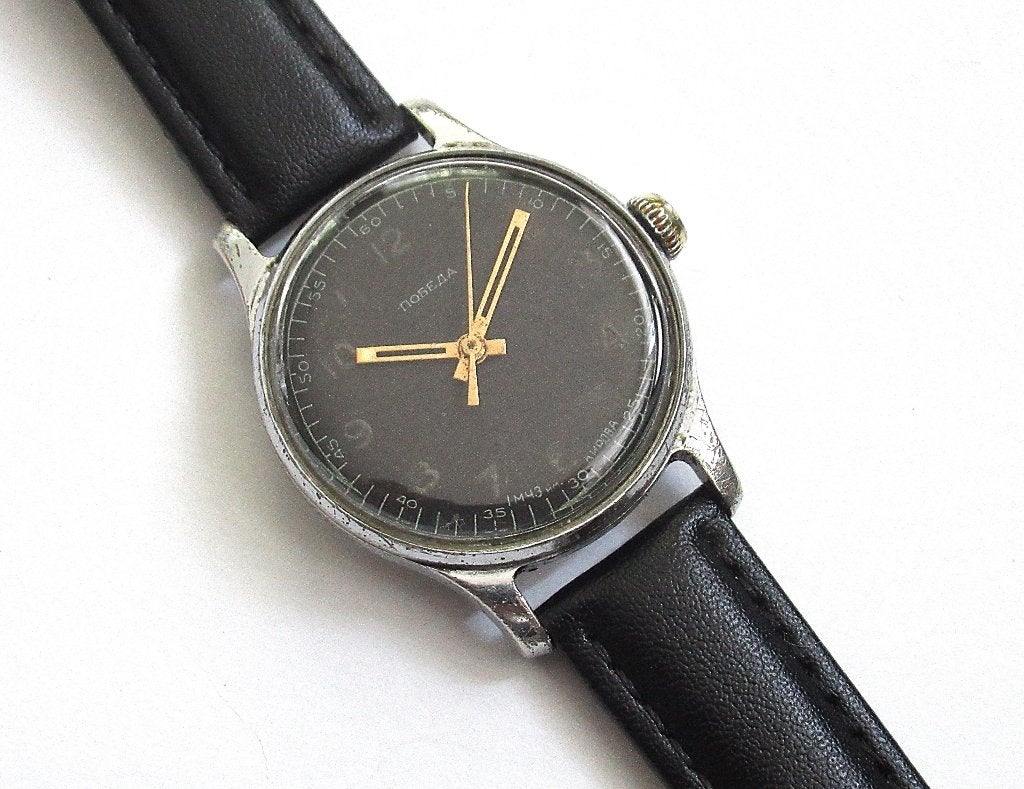 Pobeda Vintage mechanisch horloge made in USSR uit de '50., Ophalen of Verzenden, Staal, Overige merken, 1960 of later