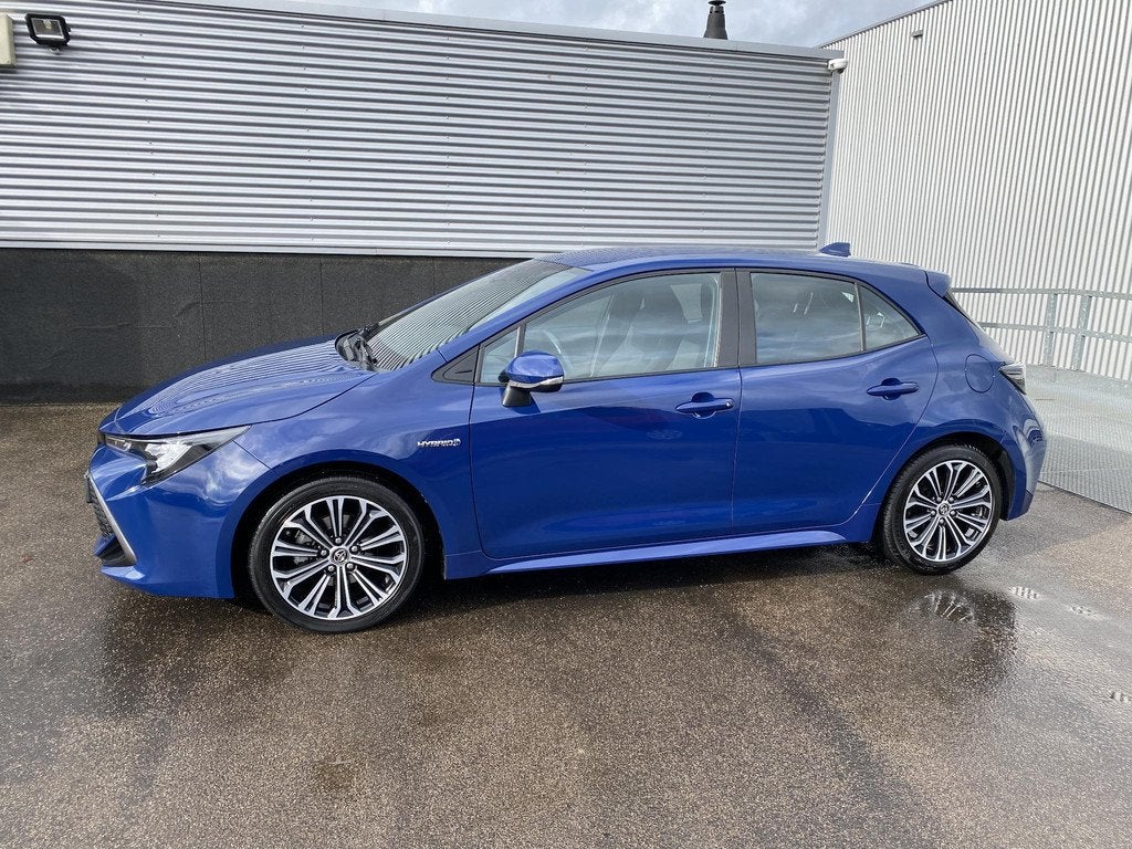 Toyota Corolla 1.8 Hybrid First Edition Trekhaak, navigatie,, Gebruikt, 4 cilinders, Blauw, Corolla