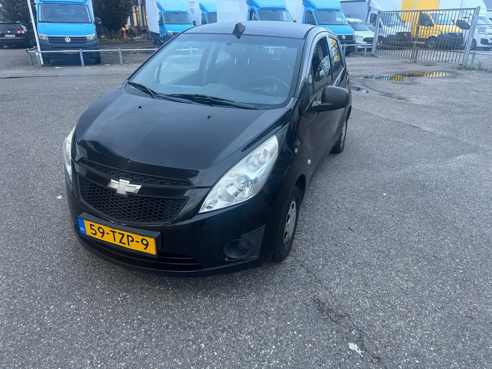 Chevrolet Spark 1.0 Bifuel 2012 Zwart, Auto's, 15 km/l, 37 €/maand, 4 cilinders, Zwart