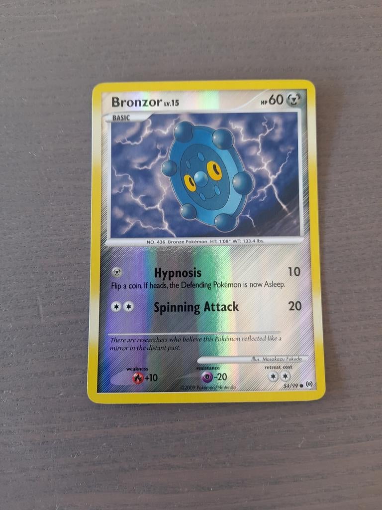 2009 arceus 54/99 bronzor reverse, Ophalen of Verzenden, Gebruikt, Losse kaart, Foil