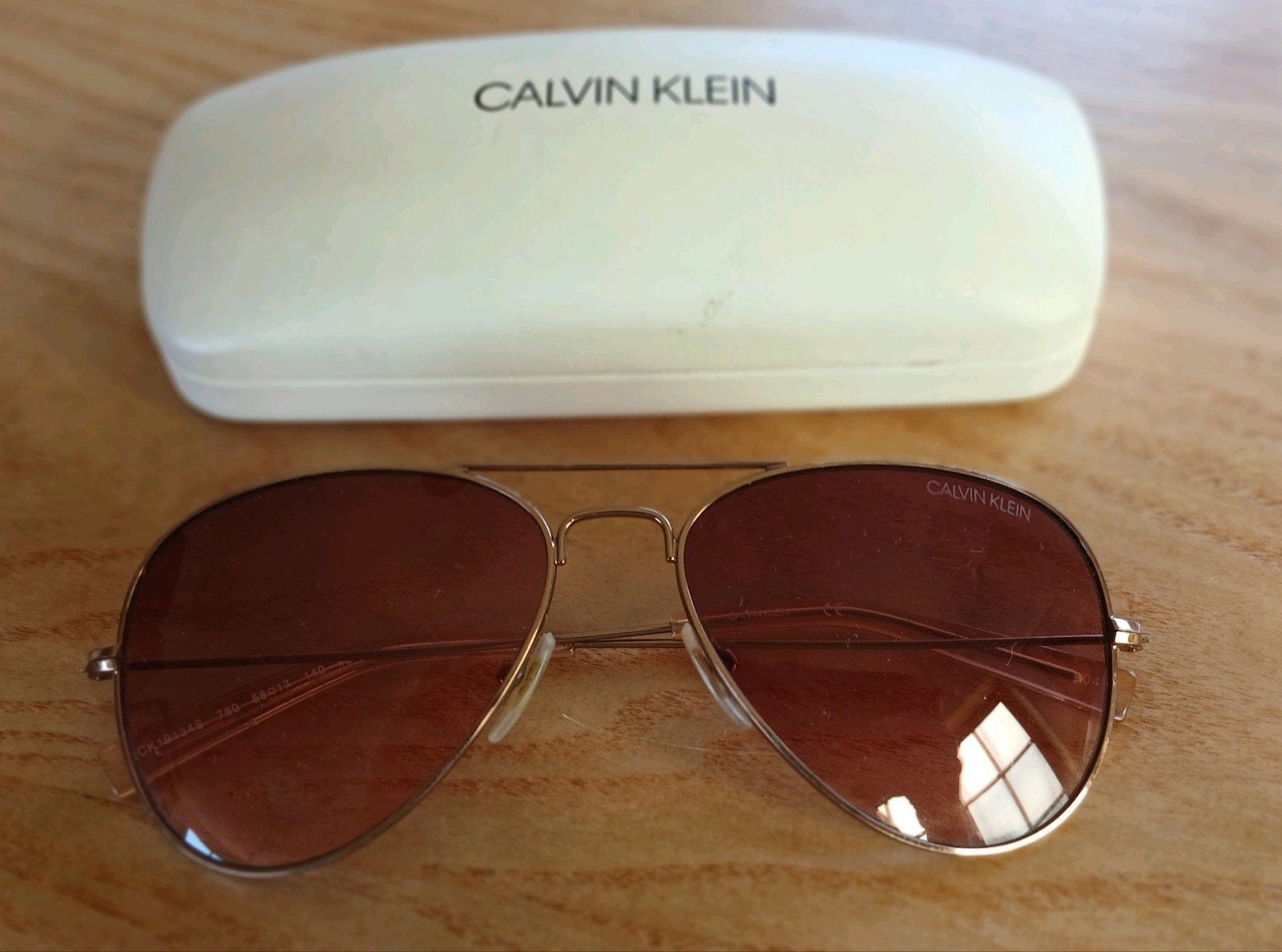 Calvin Klein pilotenbril CK19134 incl hoes, Sieraden, Tassen en Uiterlijk, Zonnebrillen en Brillen | Heren, Overige merken, Gebruikt