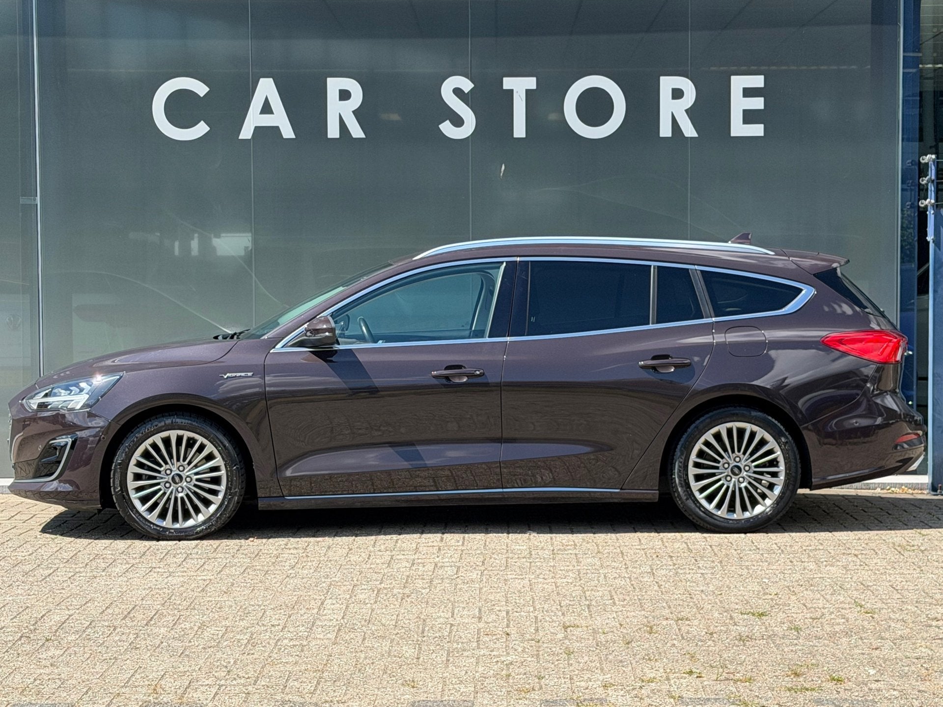 Ford Focus Wagon 1.0 EcoBoost Vignale Trekhaak /Winterpak/B&, Auto's, Ford, 125 pk, Gebruikt, Overige kleuren, 1283 kg