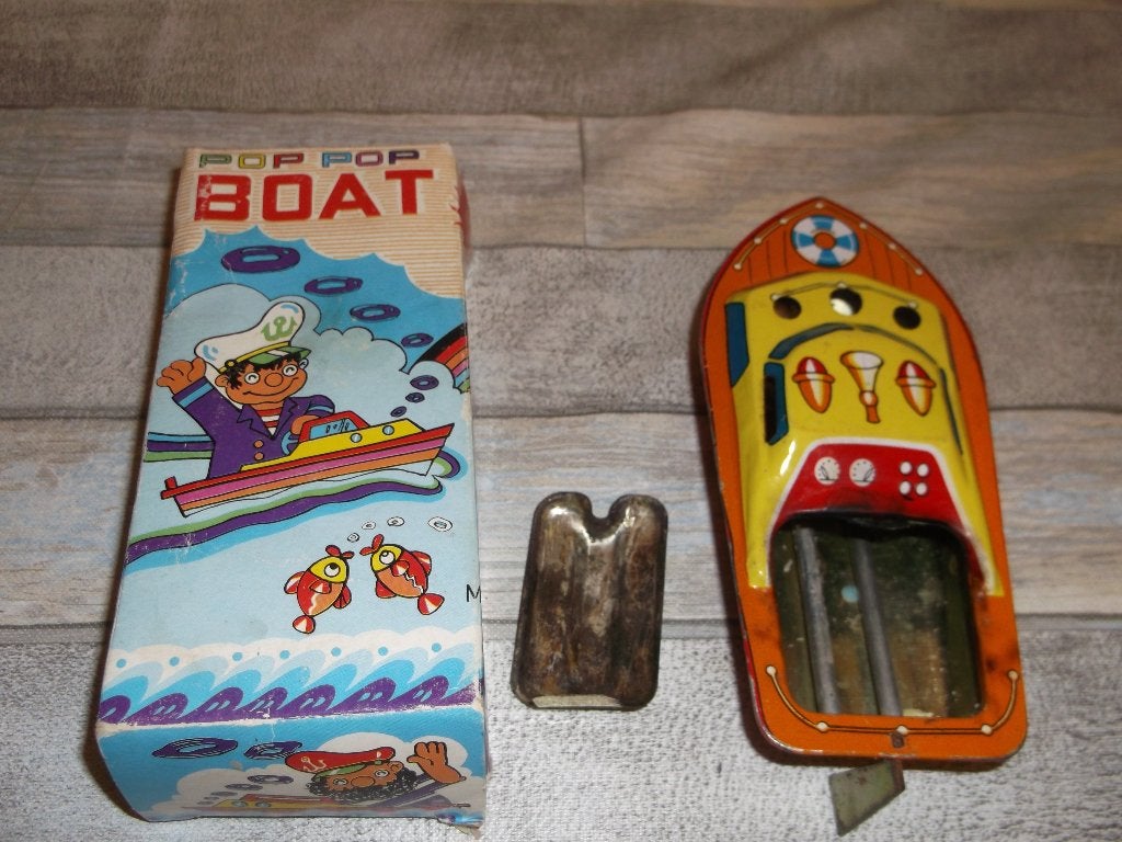 Foto 3 van blikken bootje