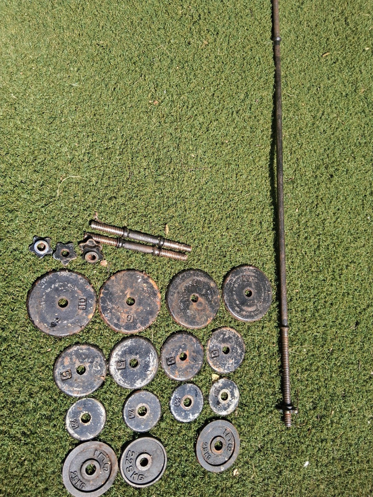 Olympische halterstang, 2 dumbells, 70 pound (31 kilo) 7.25, Ophalen of Verzenden, Gebruikt, Halterset