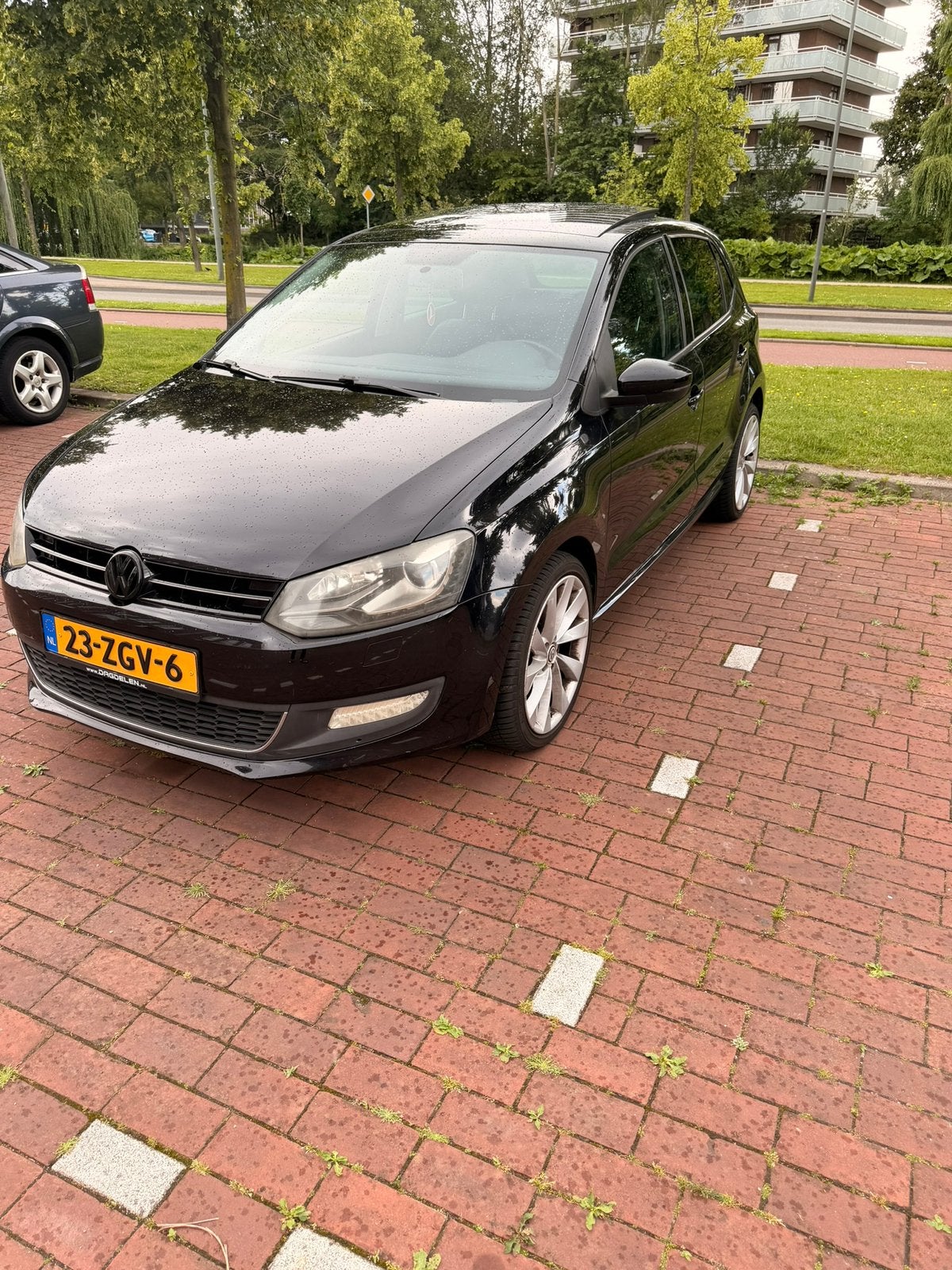 Volkswagen Polo 1.2 TSI 77KW DSG 2012 Zwart, Auto's, 40 €/maand, Zwart, 4 cilinders, Zwart