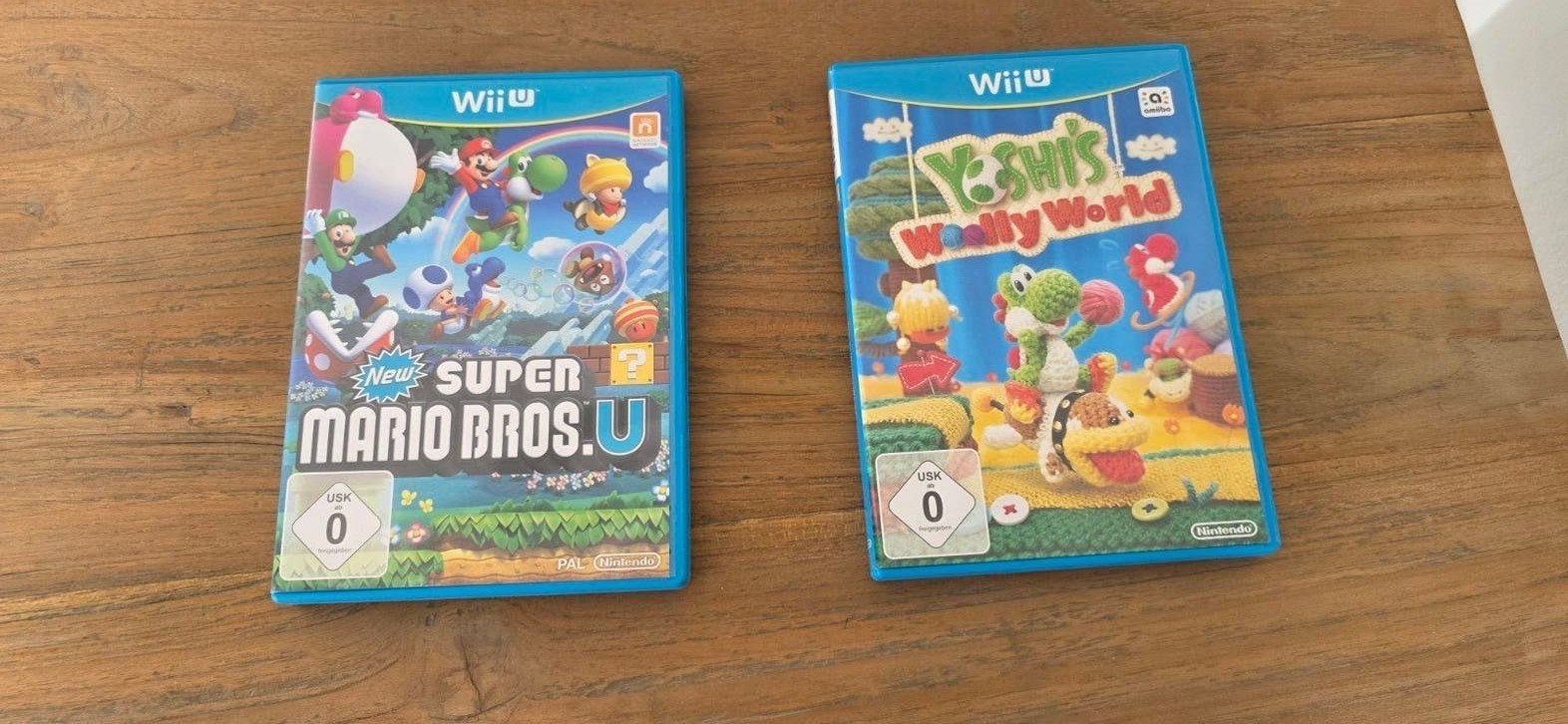 Wii U games: New Super Mario Bros U & Yoshi's Woolly World, Spelcomputers en Games, Ophalen of Verzenden, Zo goed als nieuw, Platform