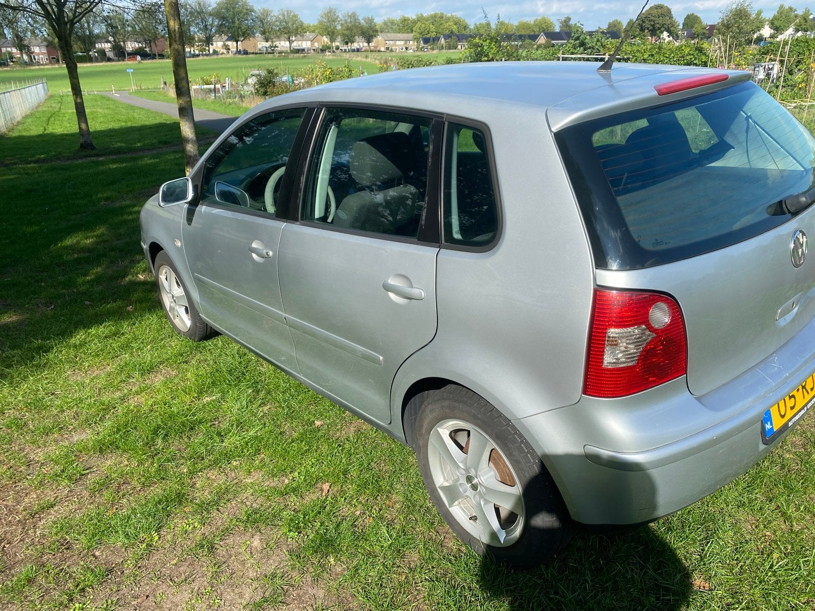 Volkswagen Polo 1.4 55KW 2005 Grijs, Auto's, Voorwielaandrijving, Elektrische ramen, 15 km/l, 4 cilinders