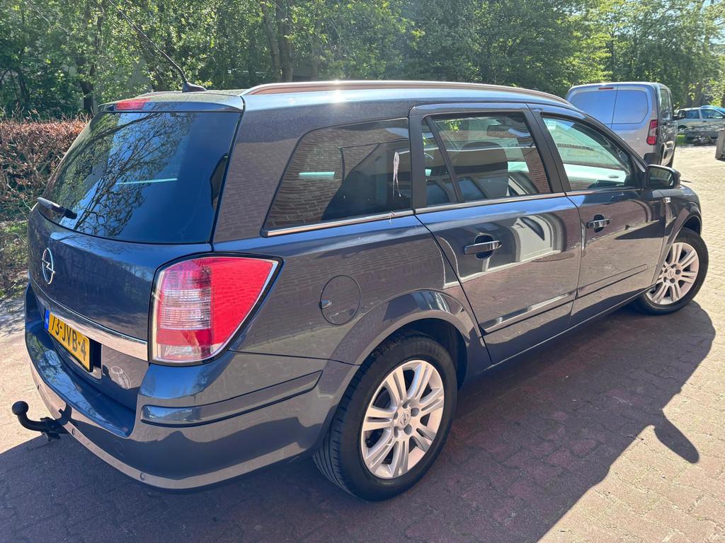 Opel Astra Wagon 1.6 Cosmo, Auto's, Opel, Voorwielaandrijving, 15 km/l, Gebruikt, Zwart