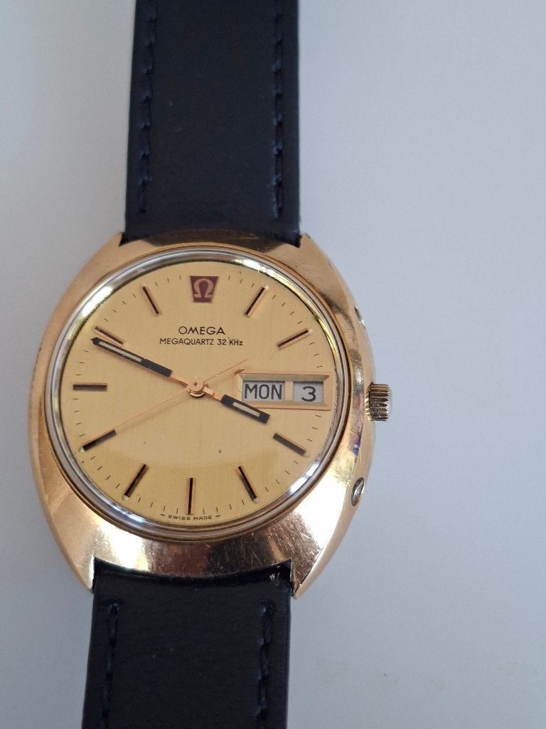 OMEGA GOUD HEREN  HORLOGE MEGAGUARTZ 32 KHz  UIT 1973, Overige materialen, Polshorloge, Verguld, Omega
