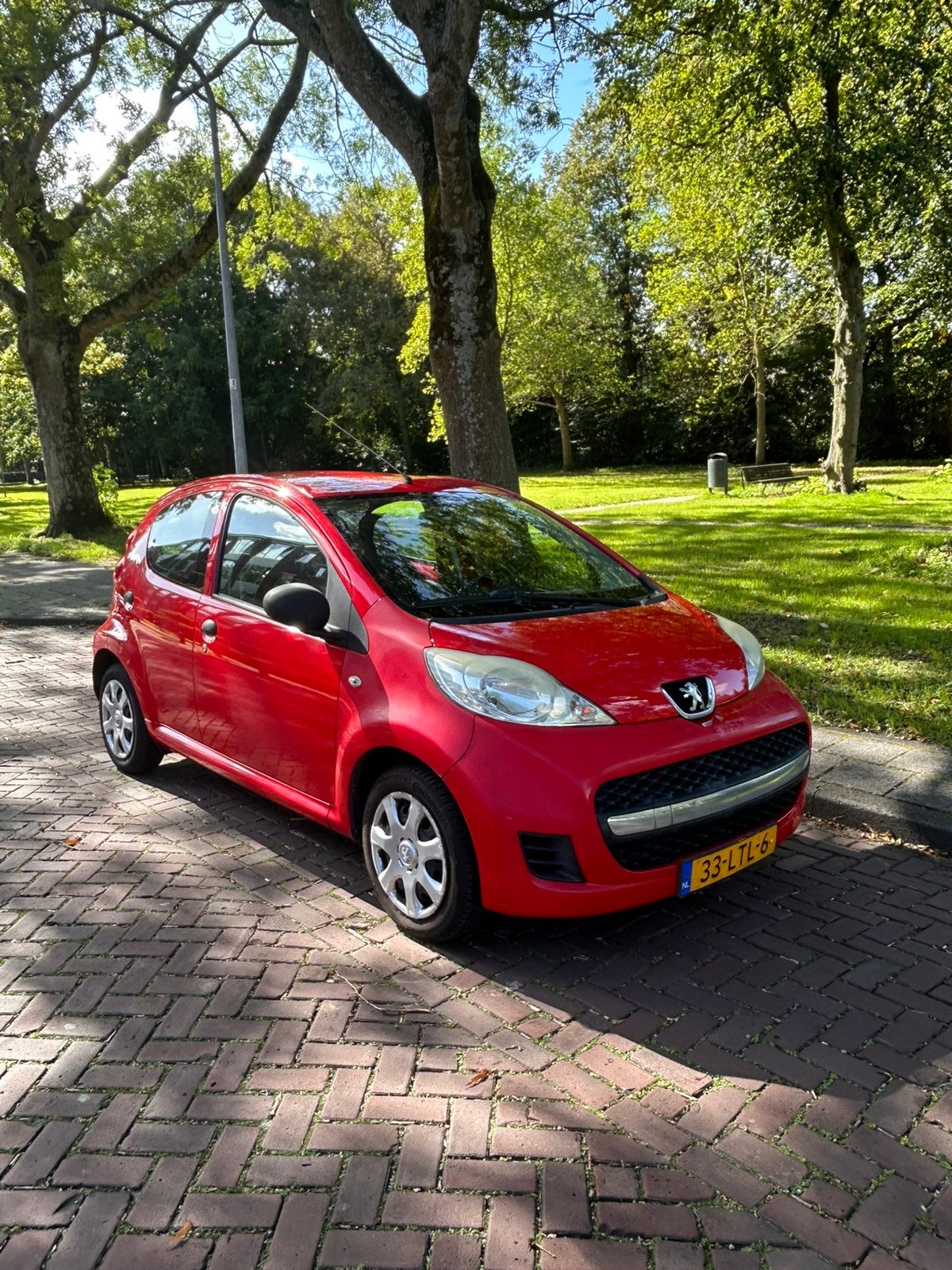 Peugeot 107 1.0 12V 5DR 2010 Rood, Voorwielaandrijving, 4 stoelen, 68 pk, Origineel Nederlands