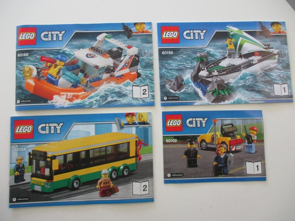 26 lego instructieboekjes, Kinderen en Baby's, Speelgoed | Duplo en Lego, City, Verzenden, Lego, Overige typen