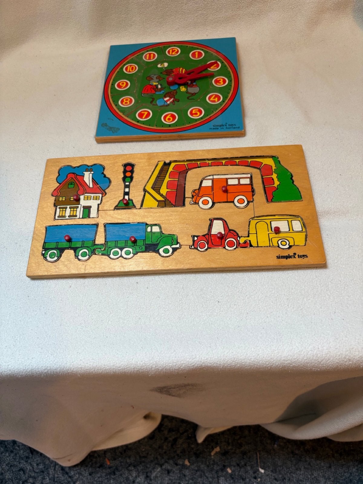 2 Houten puzzels: Klok en Voertuigen (Simplex Toys), 2 tot 4 jaar, Gebruikt, Ophalen of Verzenden, Van hout