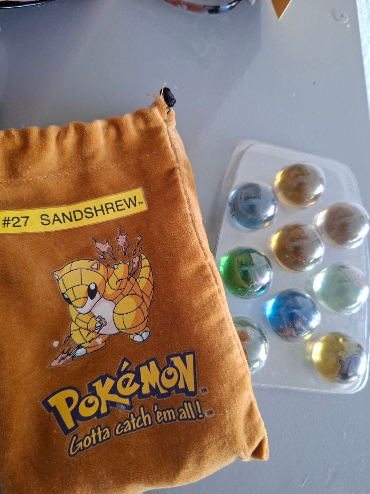 Oude Pokémon knikkers in originele kunststof verpakking., Ophalen of Verzenden