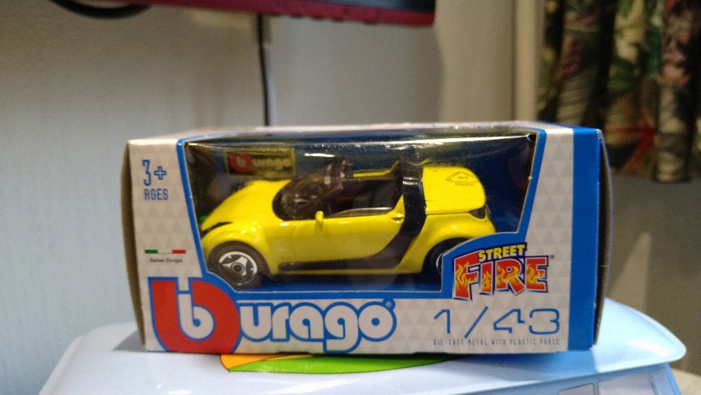 Bburago Street Fire Smart Roadster Yellow 1/43, Ophalen of Verzenden, Nieuw, Auto, Overige merken