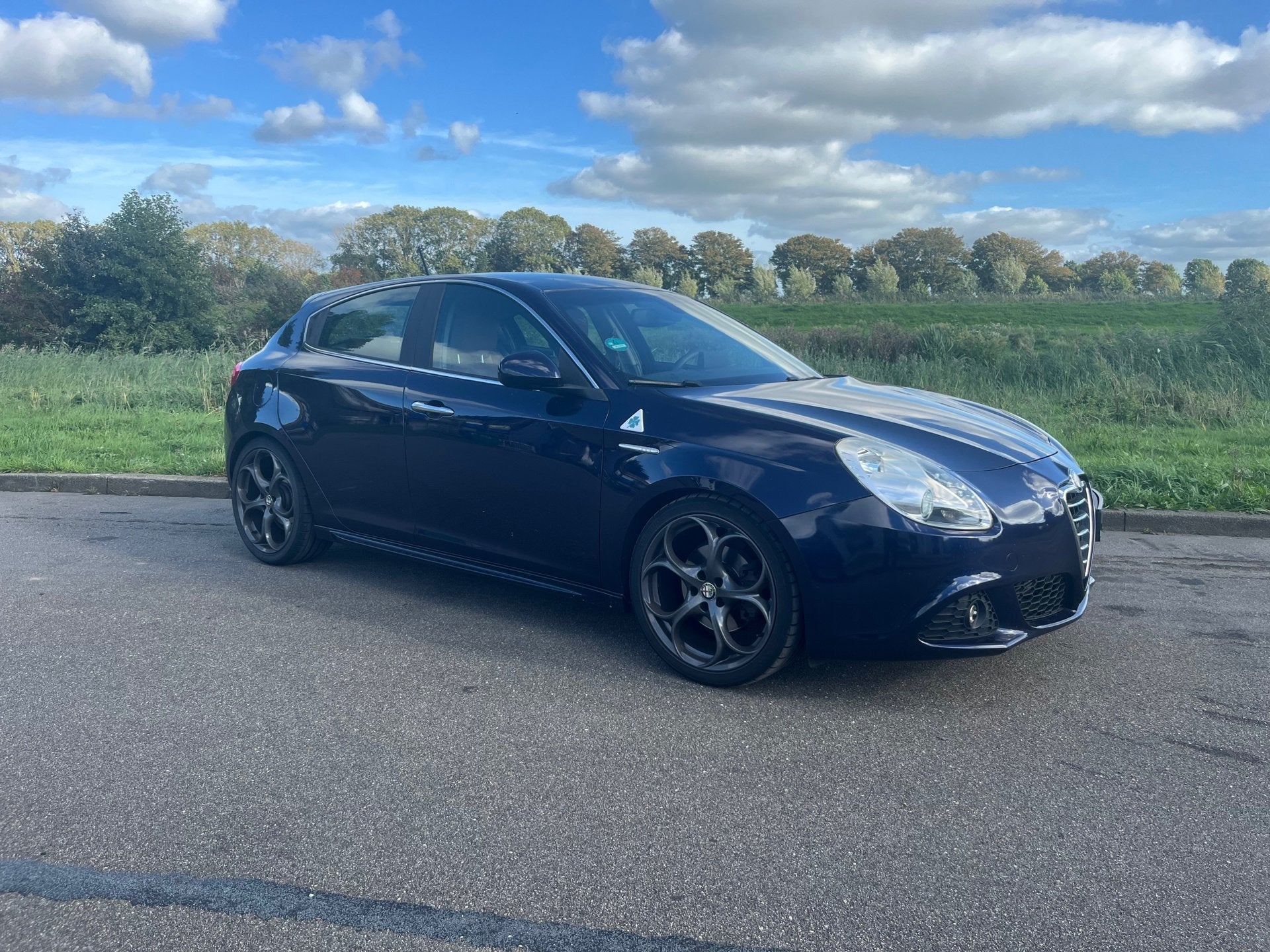 Alfa Romeo Giulietta 1.4 T Distinctive BJ 2012 AIRCO LEER 19, Auto's, Euro 5, Gebruikt, 4 cilinders, Blauw