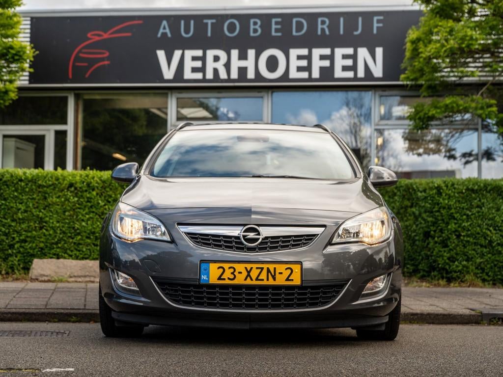 Opel Astra Sports Tourer 1.4 Turbo Sport - CRUISE / CLIMATE, Auto's, Voorwielaandrijving, Euro 5, Stof, Gebruikt