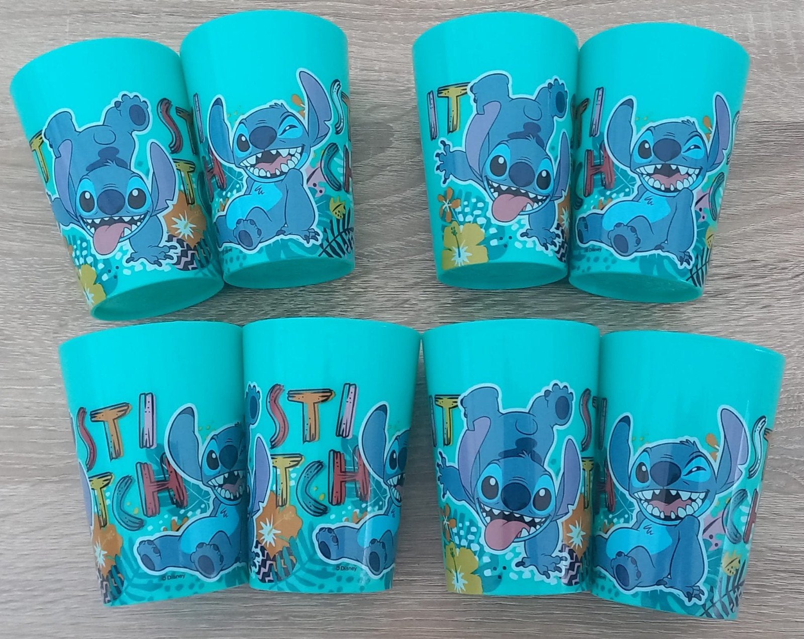 8 Stitch bekers hard plastic - Lilo & Stitch Disney nieuw, Ophalen of Verzenden, Nieuw, Meerkleurig, Kunststof