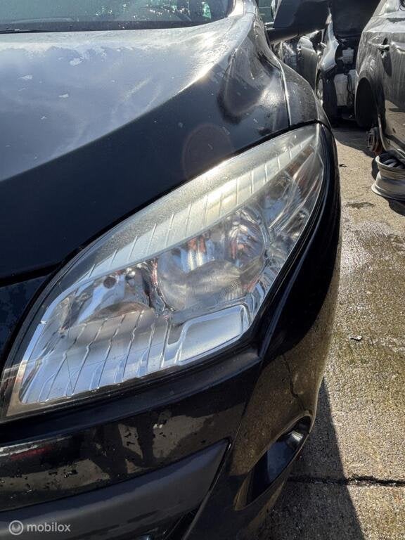 Koplamp links Renault Megane Estate III ('09-'16), Auto-onderdelen, Verlichting, Gebruikt, Renault, Ophalen of Verzenden, Renault