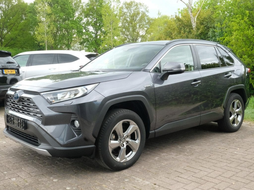 Toyota RAV4 2.5 Hybrid Business 306pk | Trekhaak | Stoelverw, Auto's, Toyota, Stof, Gebruikt, 4 cilinders, 2487 cc