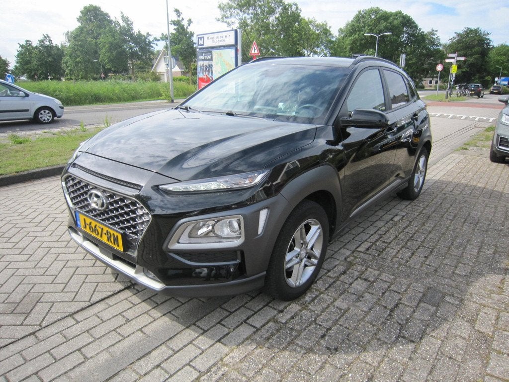 Hyundai Kona 1.0 T-GDI Fashion, Auto's, Voorwielaandrijving, Stof, Gebruikt, Zwart