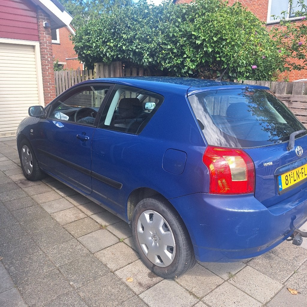 Toyota Corolla 1.4 Vvt-i - linea Terra 2003, Auto's, Voorwielaandrijving, 1398 cc, 4 cilinders, Blauw
