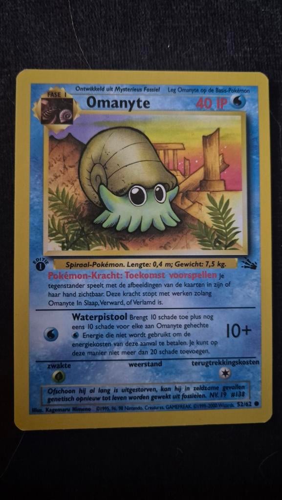 Pokémon Kaart Omanyte First Edition - Nette Staat, Ophalen of Verzenden, Zo goed als nieuw, Losse kaart