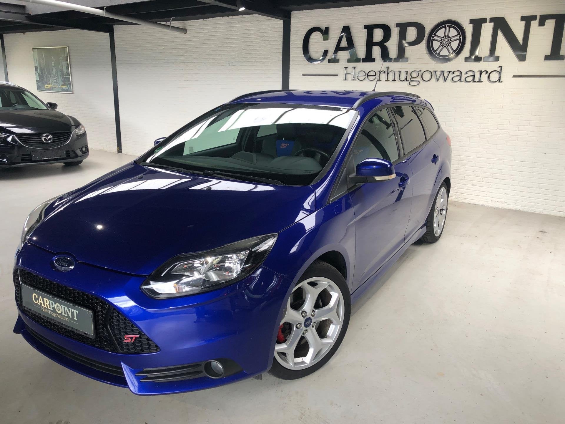 Ford Focus Wagon 2.0 EcoBoost ST-3 250 PK 2014 Recaro Cruise, Auto's, Dealer onderhouden, Gebruikt, 4 cilinders, Blauw