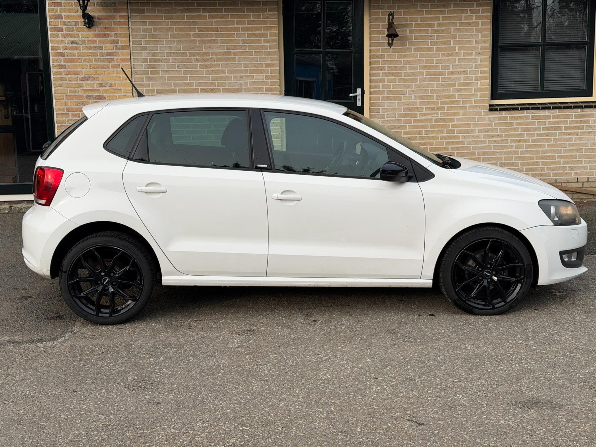 Volkswagen Polo 1.2-12V Style | NAVI | STOELVERWARMING, Auto's, Voorwielaandrijving, Euro 5, Zwart, 1198 cc