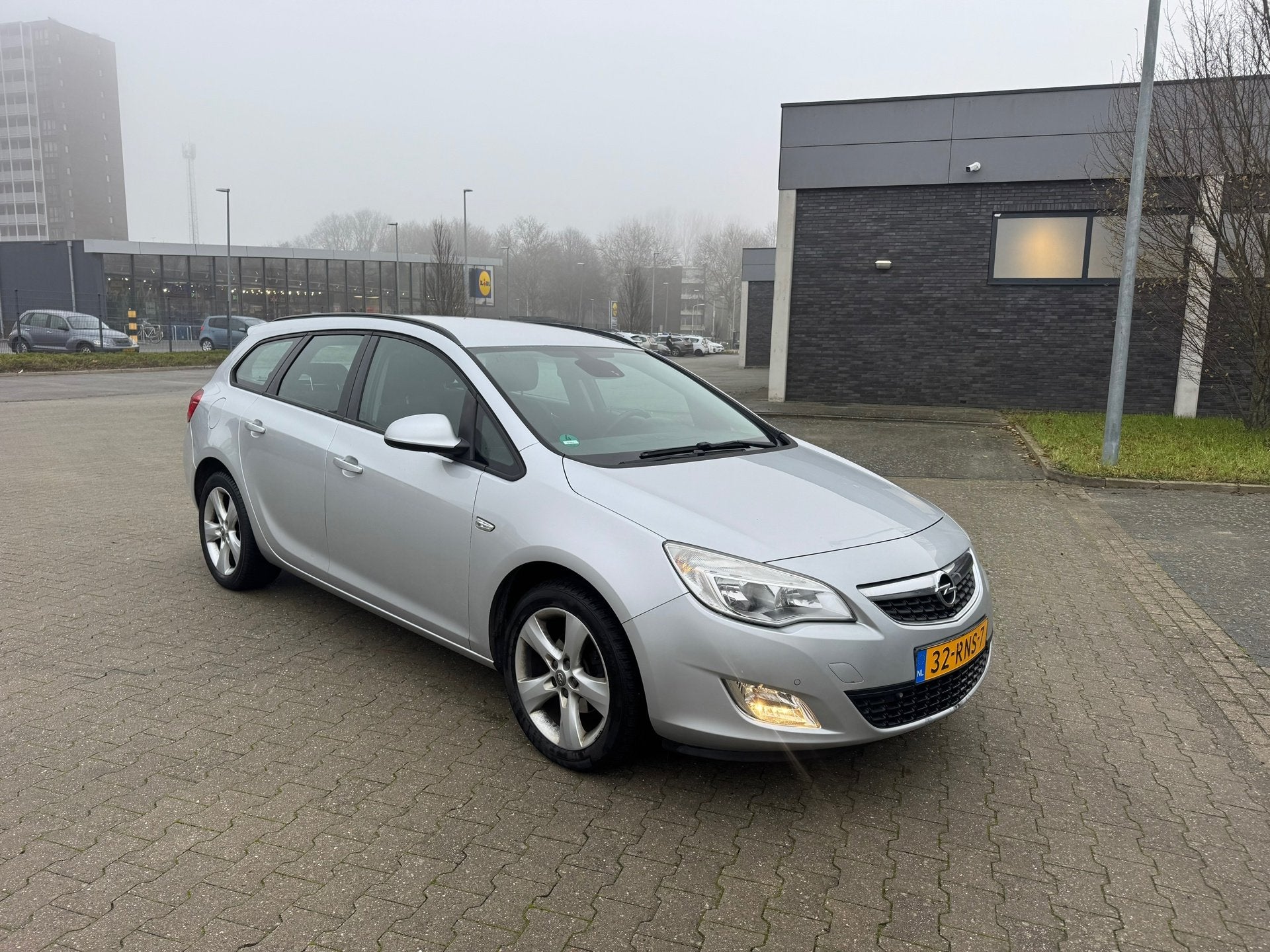 Opel Astra Sports Tourer 1.4 Turbo Edition, Voorwielaandrijving, Stof, Gebruikt, 4 cilinders
