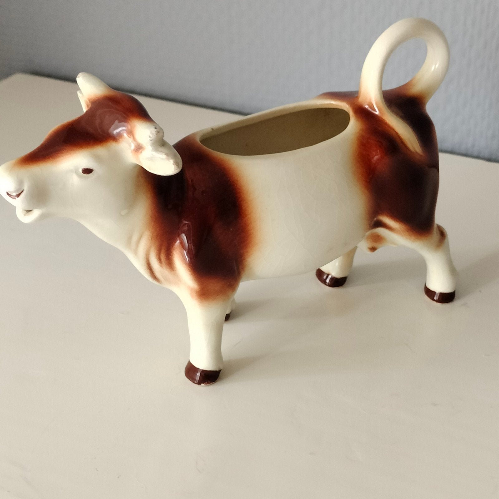 Goebel melkkannetje koe, Ophalen