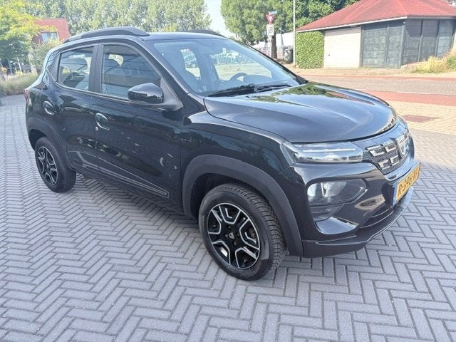 Dacia Spring Electric 2022 | 62.924 km | SOH 92 | 1 JAAR GAR, Auto's, Dacia, Stof, 38 min, 4 stoelen, Zwart