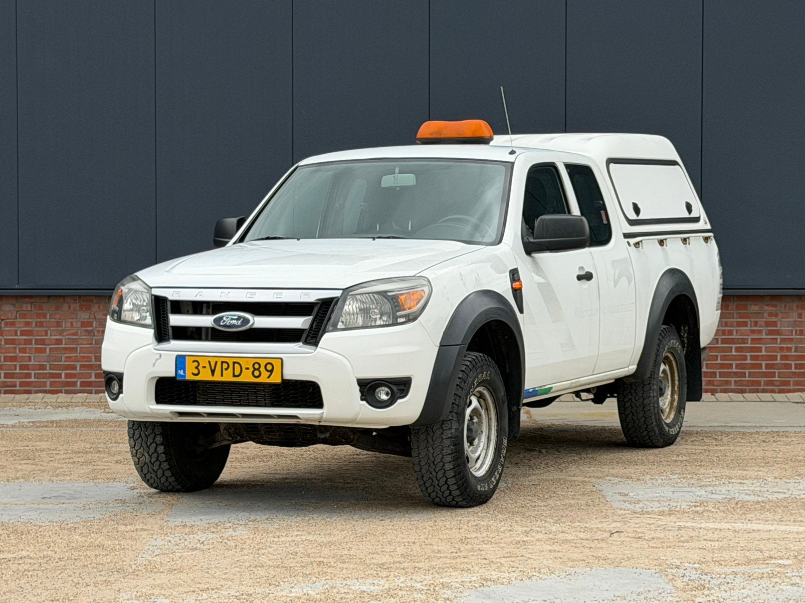 Ford Ranger 2.5 D 143pk SuperCab 4WD bj. 2011, Auto's, Bestelauto's, 2500 cc, Stof, Zwart, 3000 kg