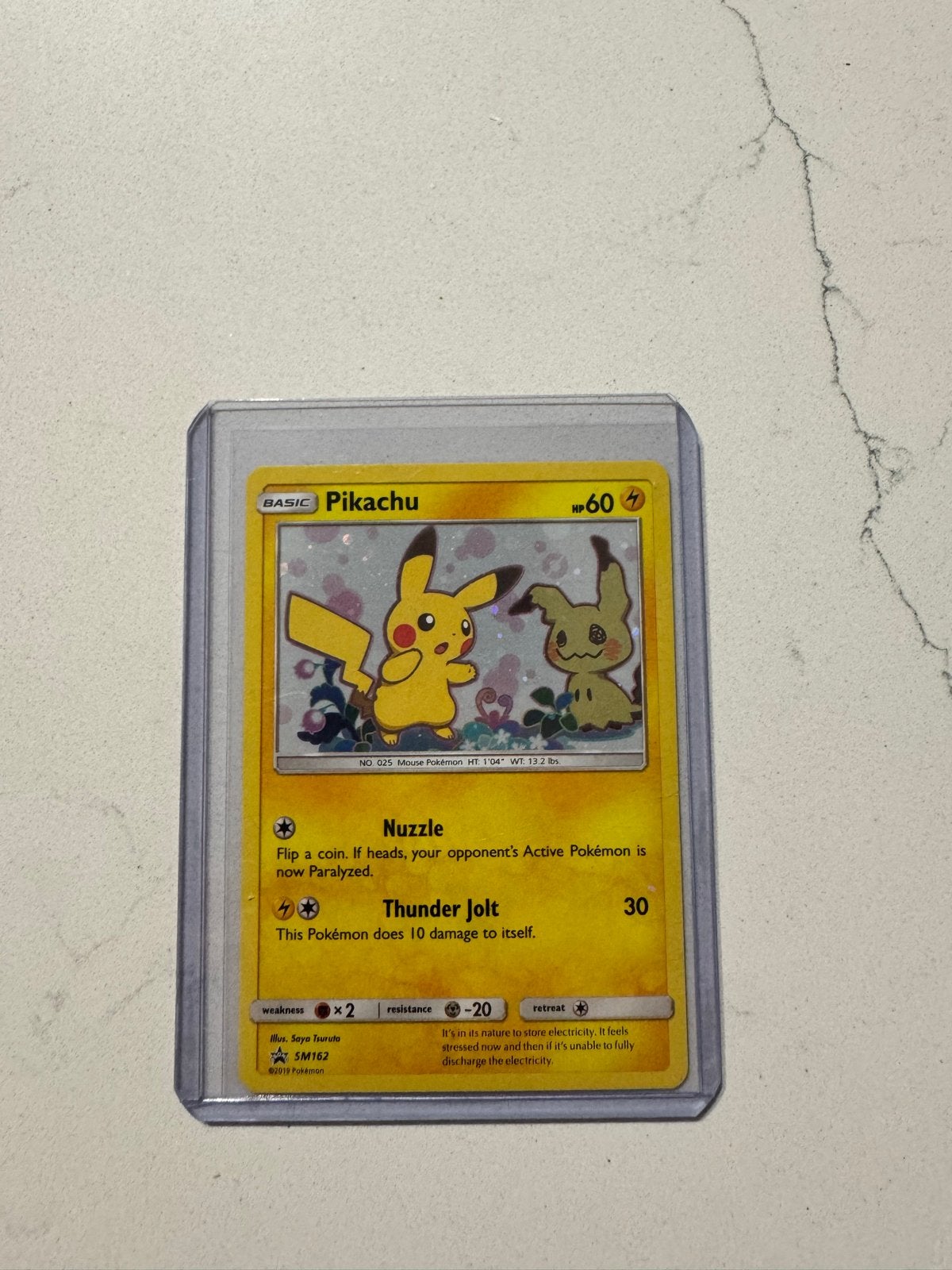 Pokemon kaart, Pikachu Sun & Moon Promo Cosmos Holo, Ophalen of Verzenden, Zo goed als nieuw, Losse kaart, Foil