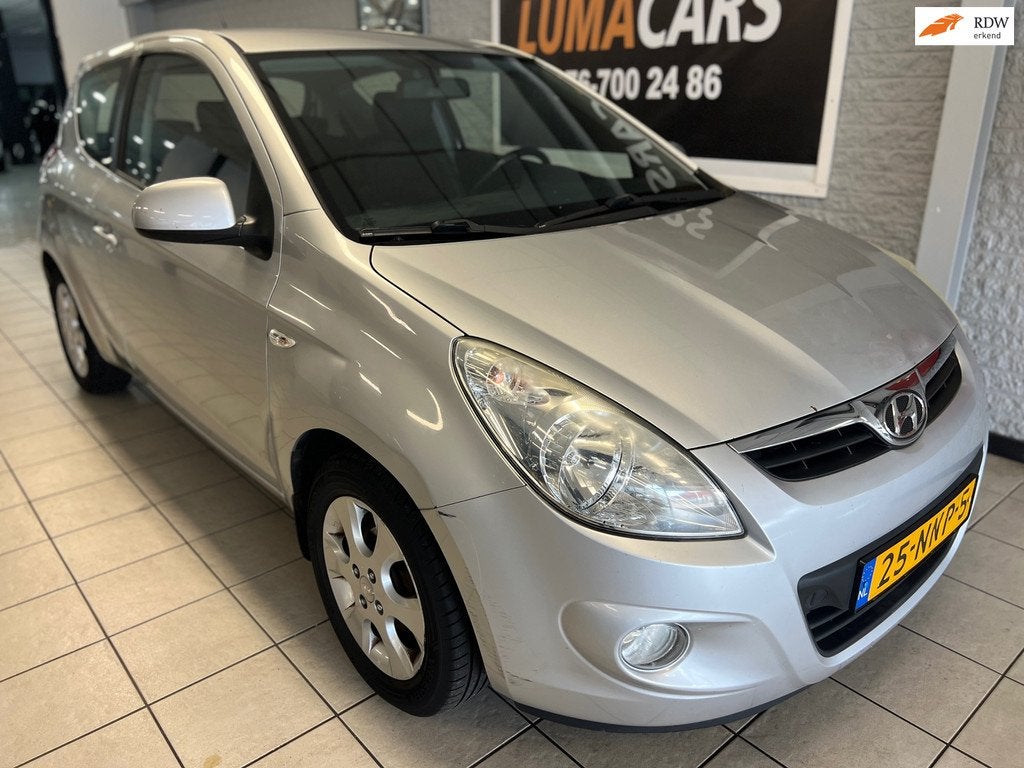 Hyundai I20 1.4i i-Catcher | Nieuwe APK | Leder | Elektr. |, Auto's, Hyundai, Voorwielaandrijving, 4 cilinders, 1396 cc, Leder en Stof